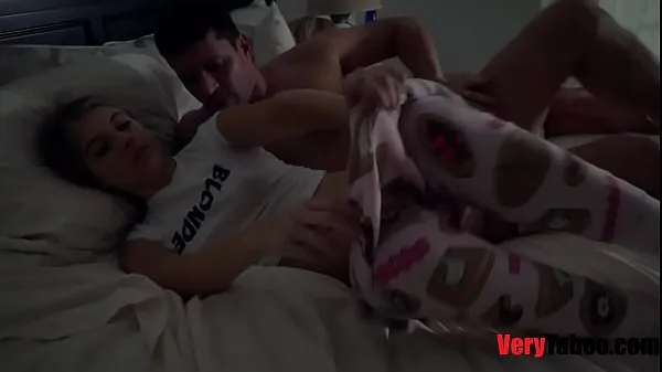 Stepdad fucks young stepdaughter while stepmom naps