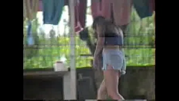 Hot Sula laying out clothes in the backyard in short shorts new Videos